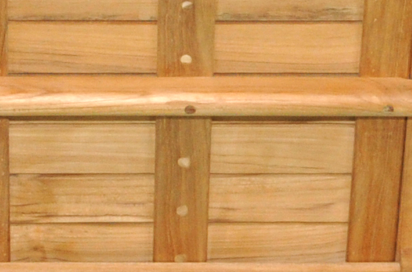 Screws covered by blind dowels in premium teak furniture